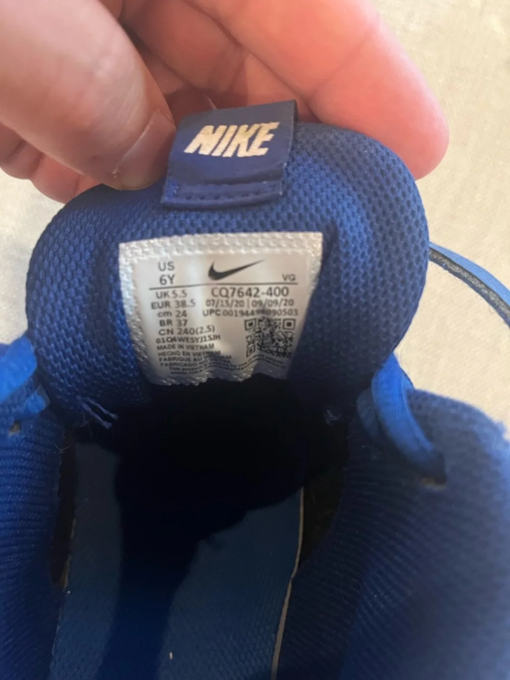 Nike Kids Blue and White High-Top football cleats